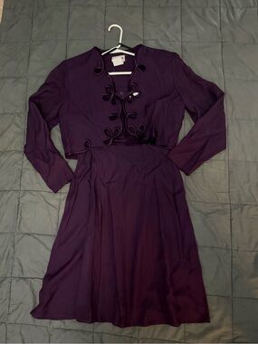 Purple dress with matching bolero jacket. Size: 10 P
